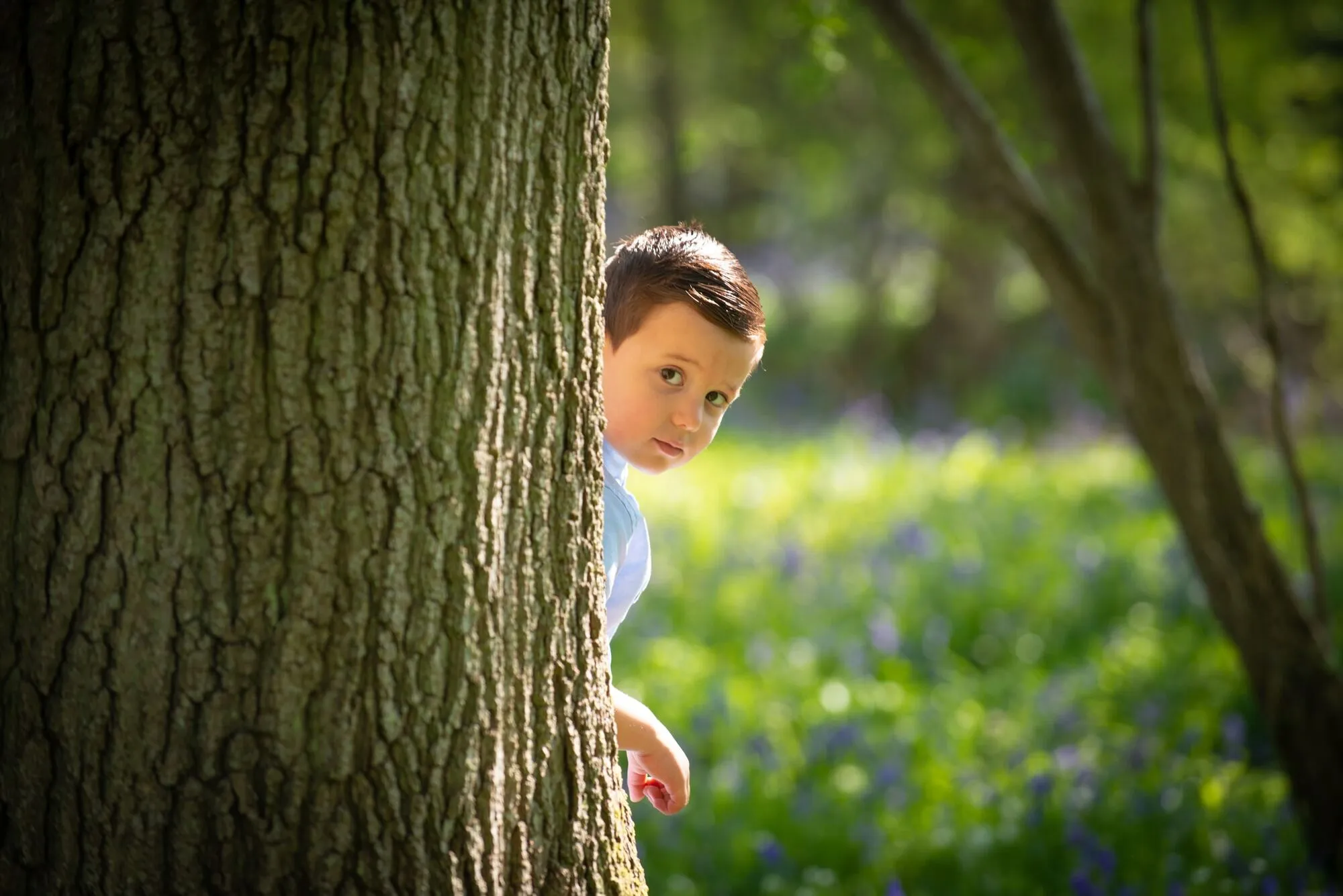 A family photographed naturally outdoors by Helen Tinner